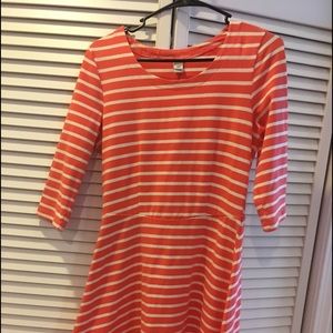 Pink striped dress thats 93% cotton and 7% spandex